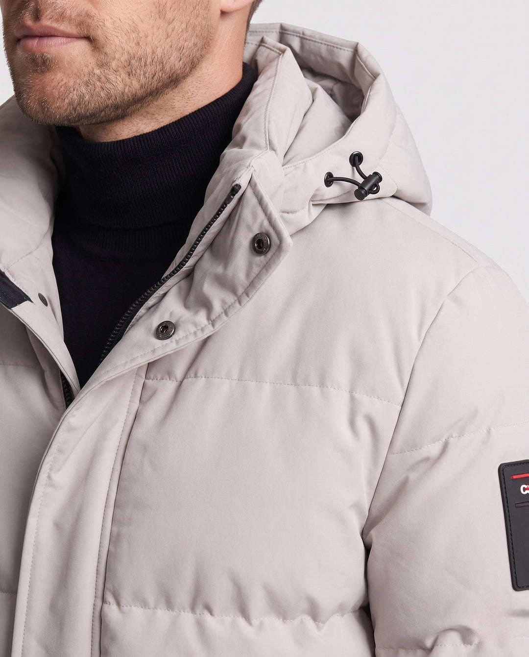 Men's Short Coat in Minimalist Quilted Design with Stowable Hood and Concealed Zip Pockets