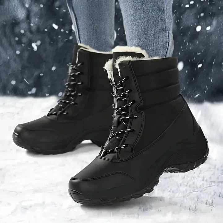 Women's waterproof snow boots with faux fur trim lace up ankle style