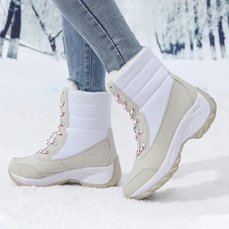 Women's waterproof snow boots with faux fur trim lace up ankle style