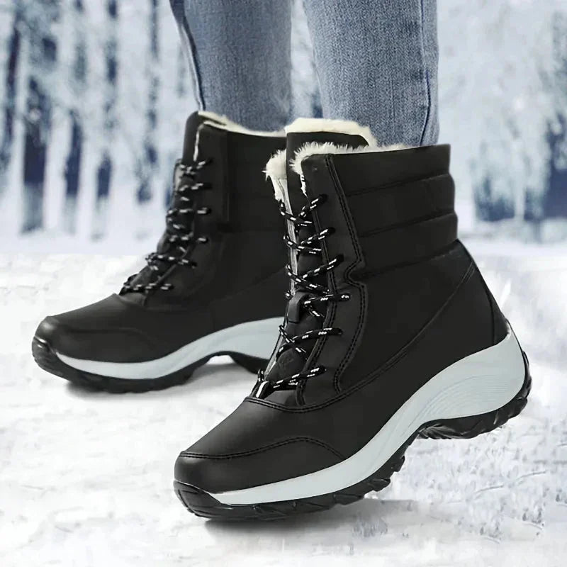Women's waterproof snow boots with faux fur trim lace up ankle style