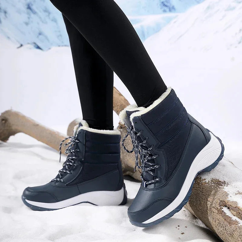 Women's waterproof snow boots with faux fur trim lace up ankle style