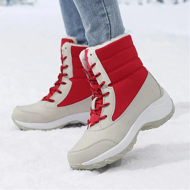Women's waterproof snow boots with faux fur trim lace up ankle style